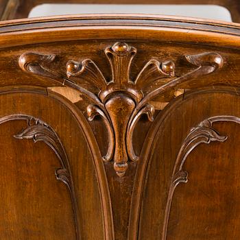 A pair of early 20th Century art nouveau style beds.