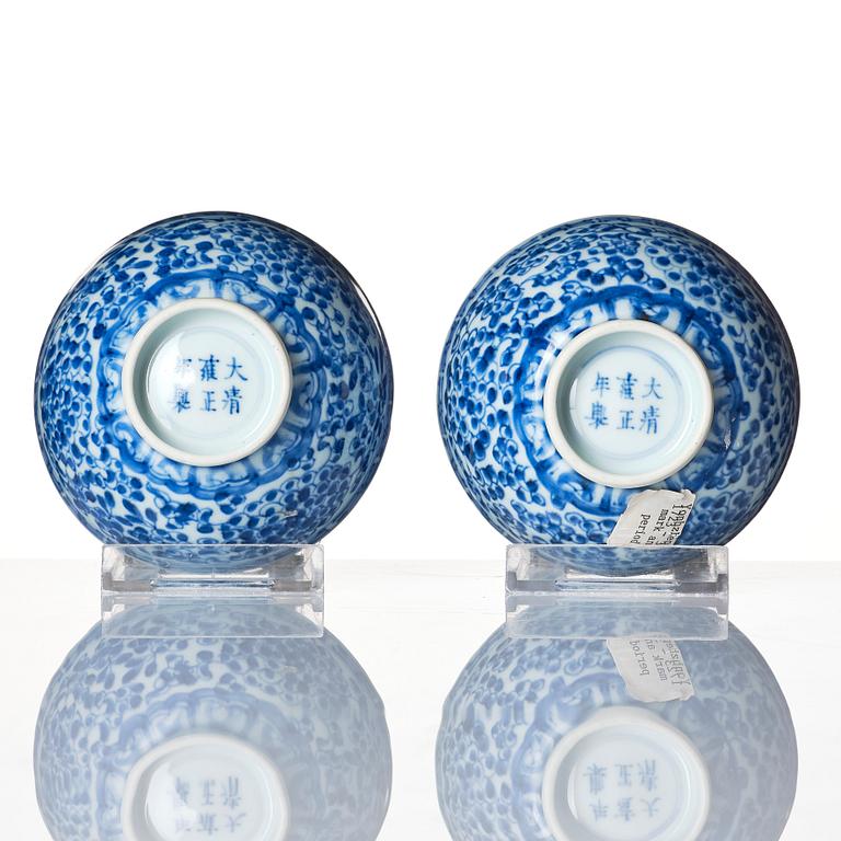 A pair of blue and white bowls, Qing dynasty with Yongzheng mark and of the period (1723-35).