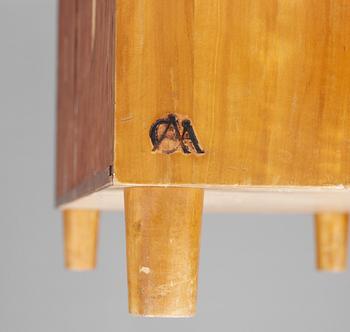 A Carl-Axel Acking elm chest of drawers with brass handles, by Svenska Möbelfabrikerna Bodafors, 1930's.