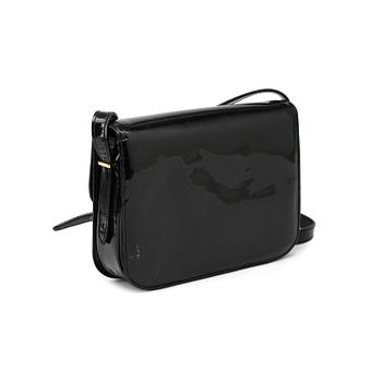 CÉLINE, a black patent leather cross-body bag.