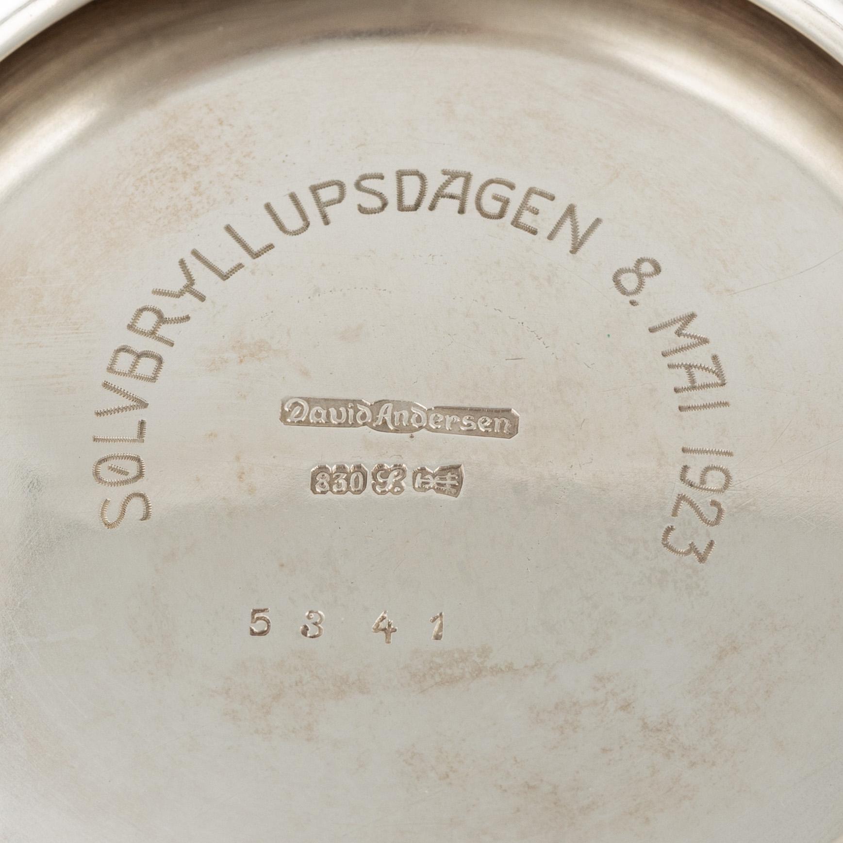 A Norwegian Silver Teapot, Sugar Bowl and Creamer, mark of David Andersen, Oslo circa 1923.