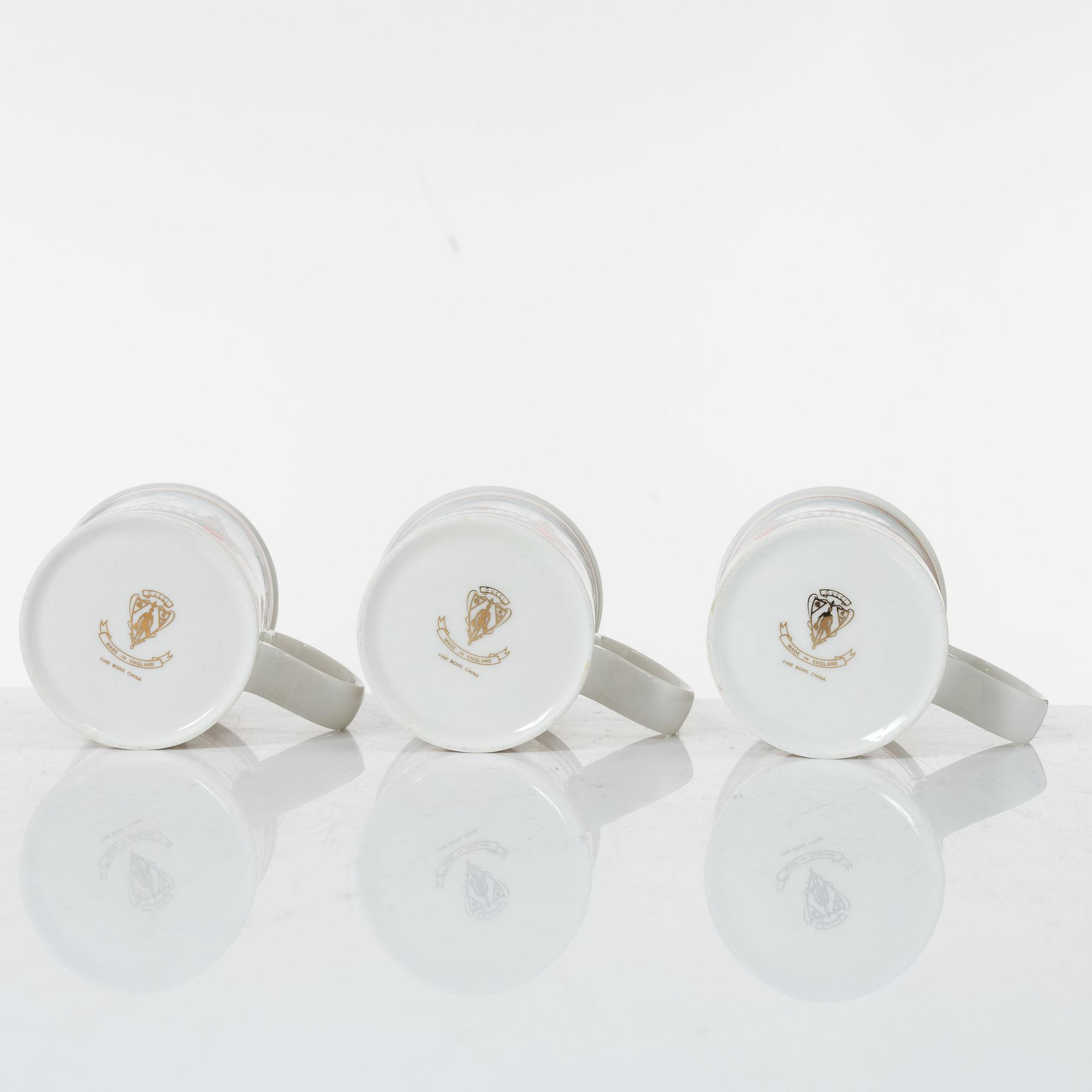 Gucci, A set of six vintage christmas mugs.