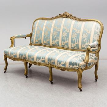 A late 19th century rococo style sofa.