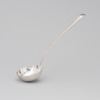 A soup ladle in sterling silver, mark of George William Adams, London 1867.