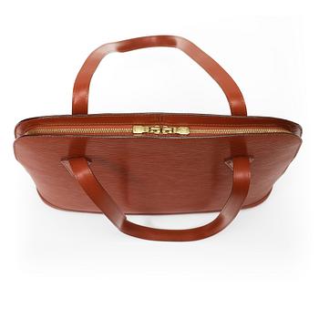 A 1999 terracotta epi leather handbag by Louis Vuitton.