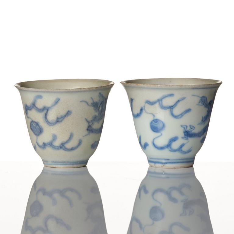 A pair of blue and white wine cups, 'Hatcher Cargo', 17th Century.