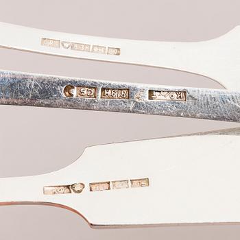 A 111-piece set of shell decorated silver cutlery, Finland, mainly from the first half of the 20th Century.