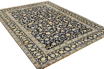 A Kashan carpet, c. 385 x 287 cm.