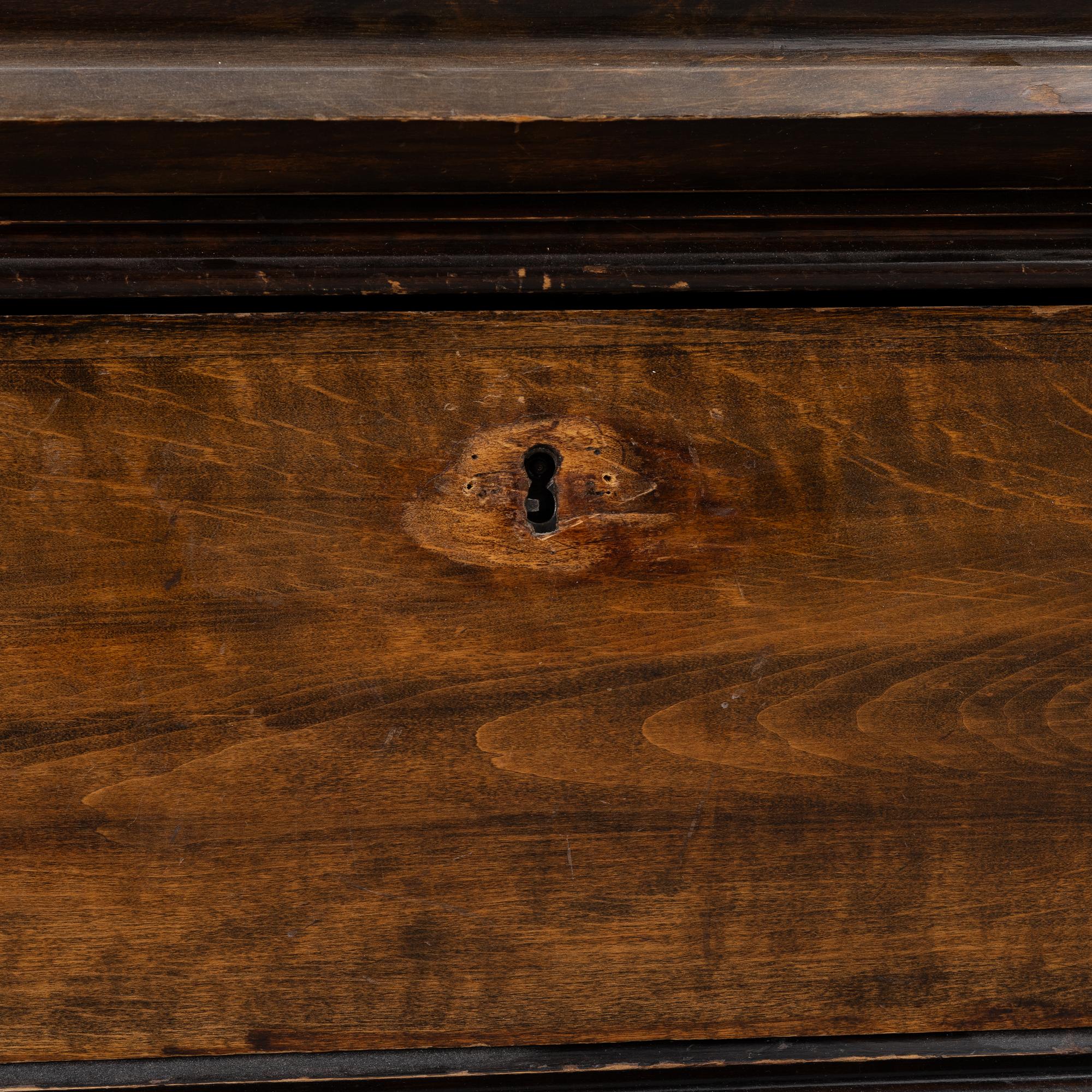 A book cabinet, around 1900.