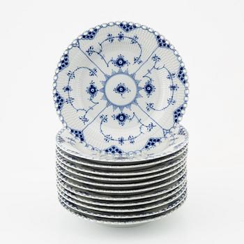 Royal Copenhagen, a set of 12 porcelain 'Musselmalet' full blonde plates, modelnr 1984.
