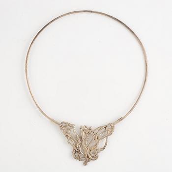 Lars Arby, three neck rings with pendants, silver, Gothenburg including 1977, 1978, and 1982.