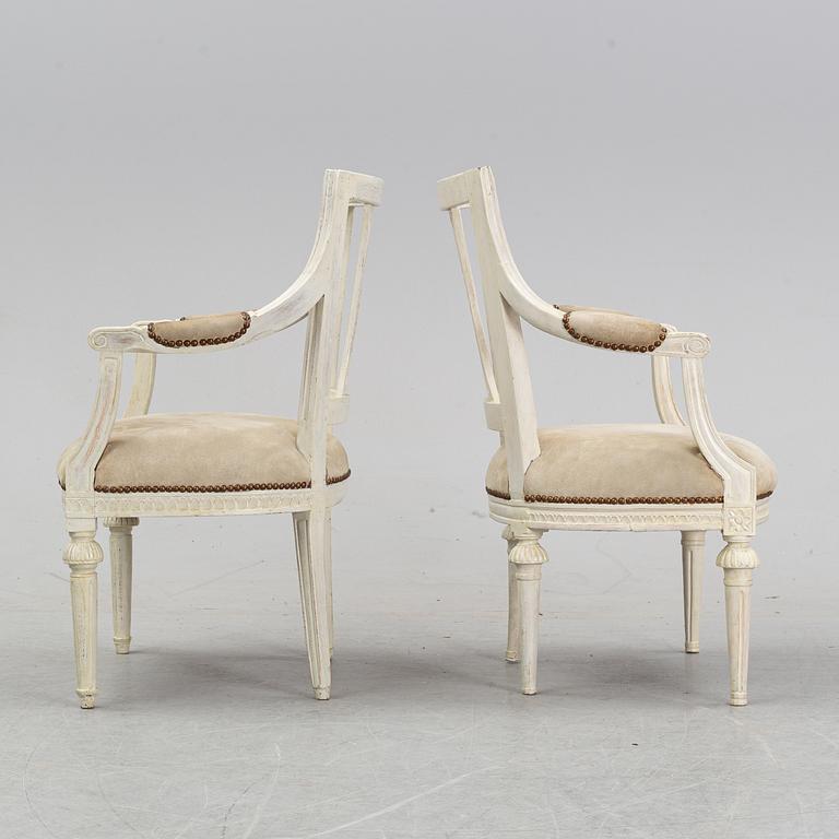 A set of two Gustavian arm chairs from the early 19th Century.