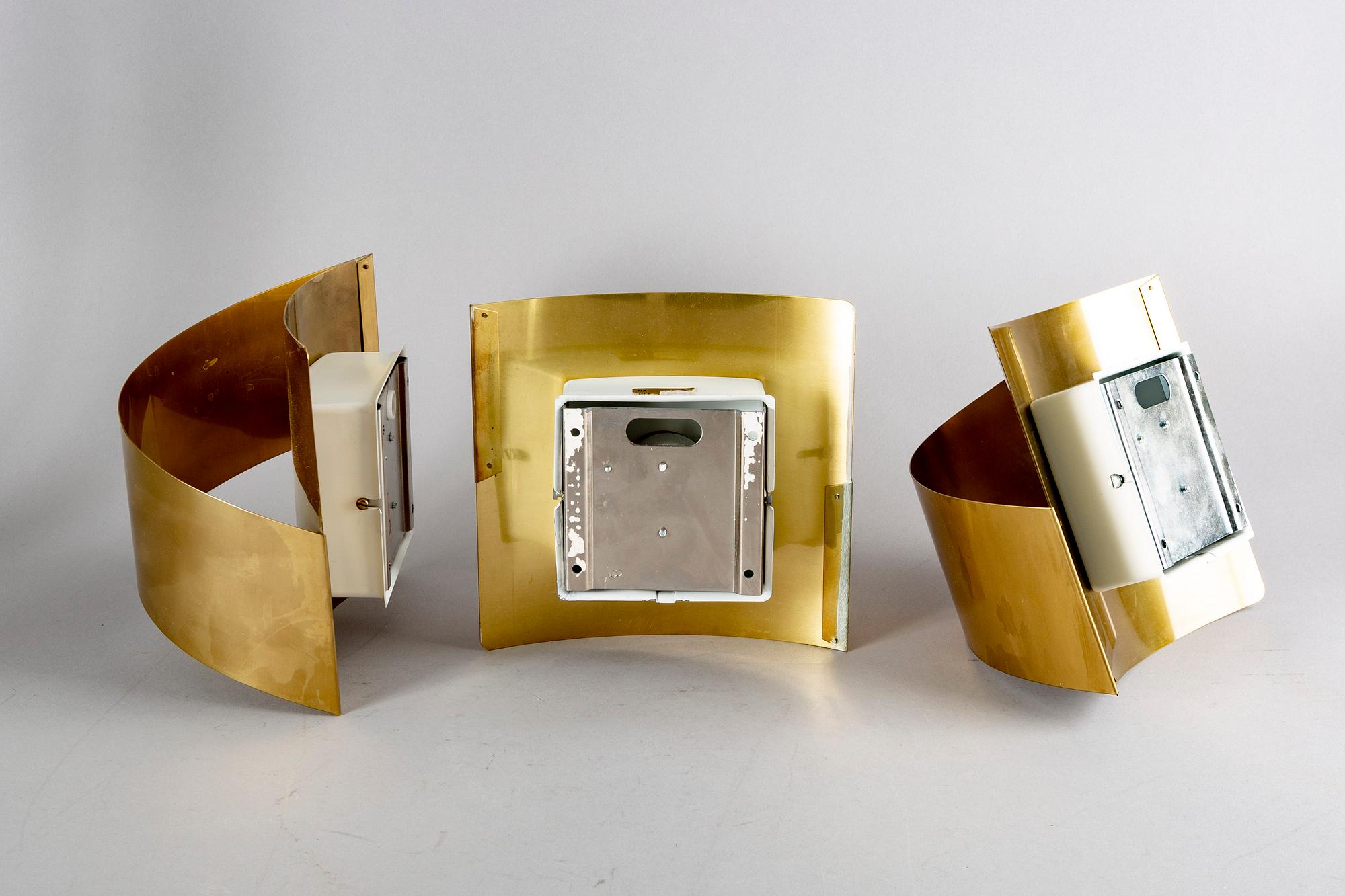 A set fo six Peter Celsing brass "Band" wall lamps Falkenberg 1960/70s.