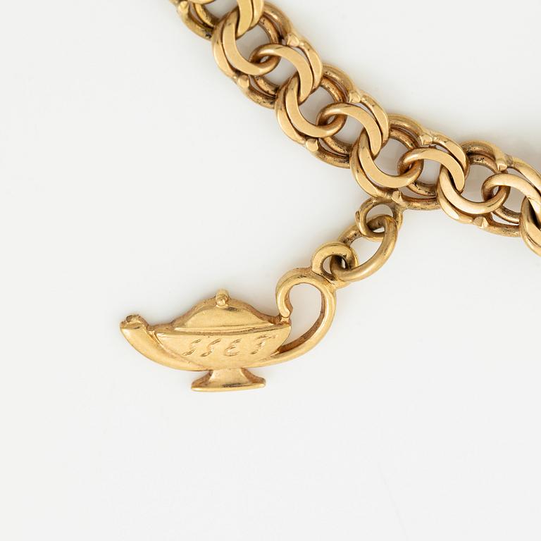Bracelet, 18K gold with charms.