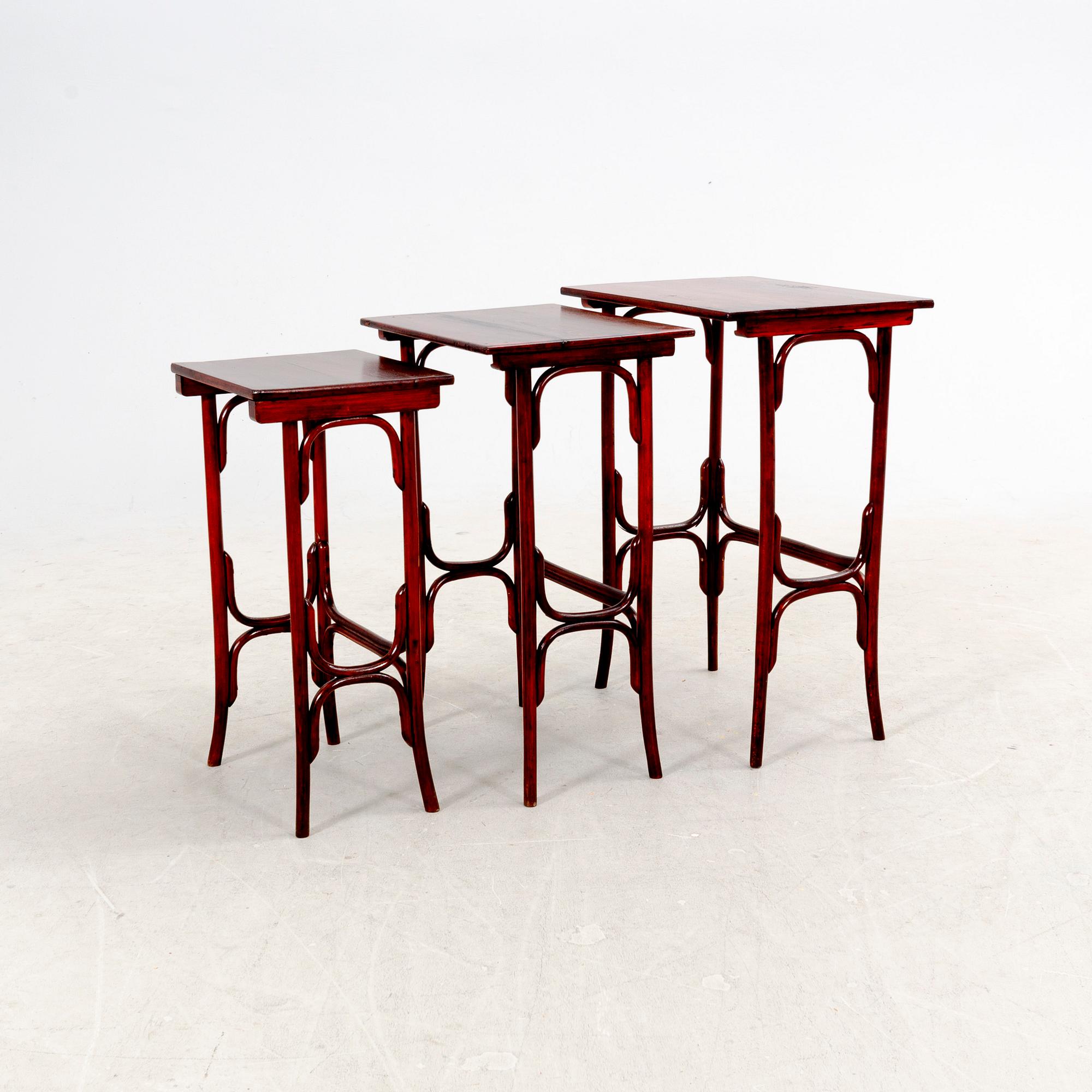 A three-part nesting table first part of the 20th Century.