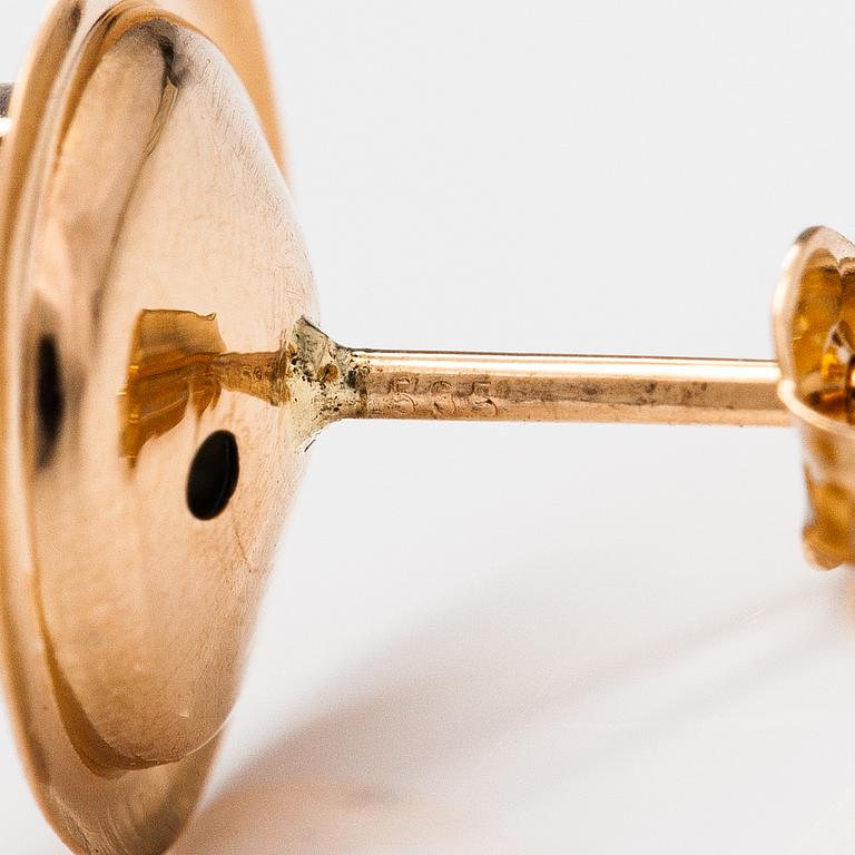 A pair of 14K gold earrings with zircones.