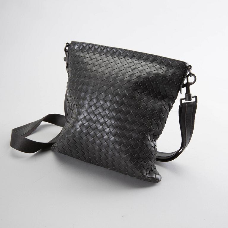 A Bottega Veneta leather messanger bag.