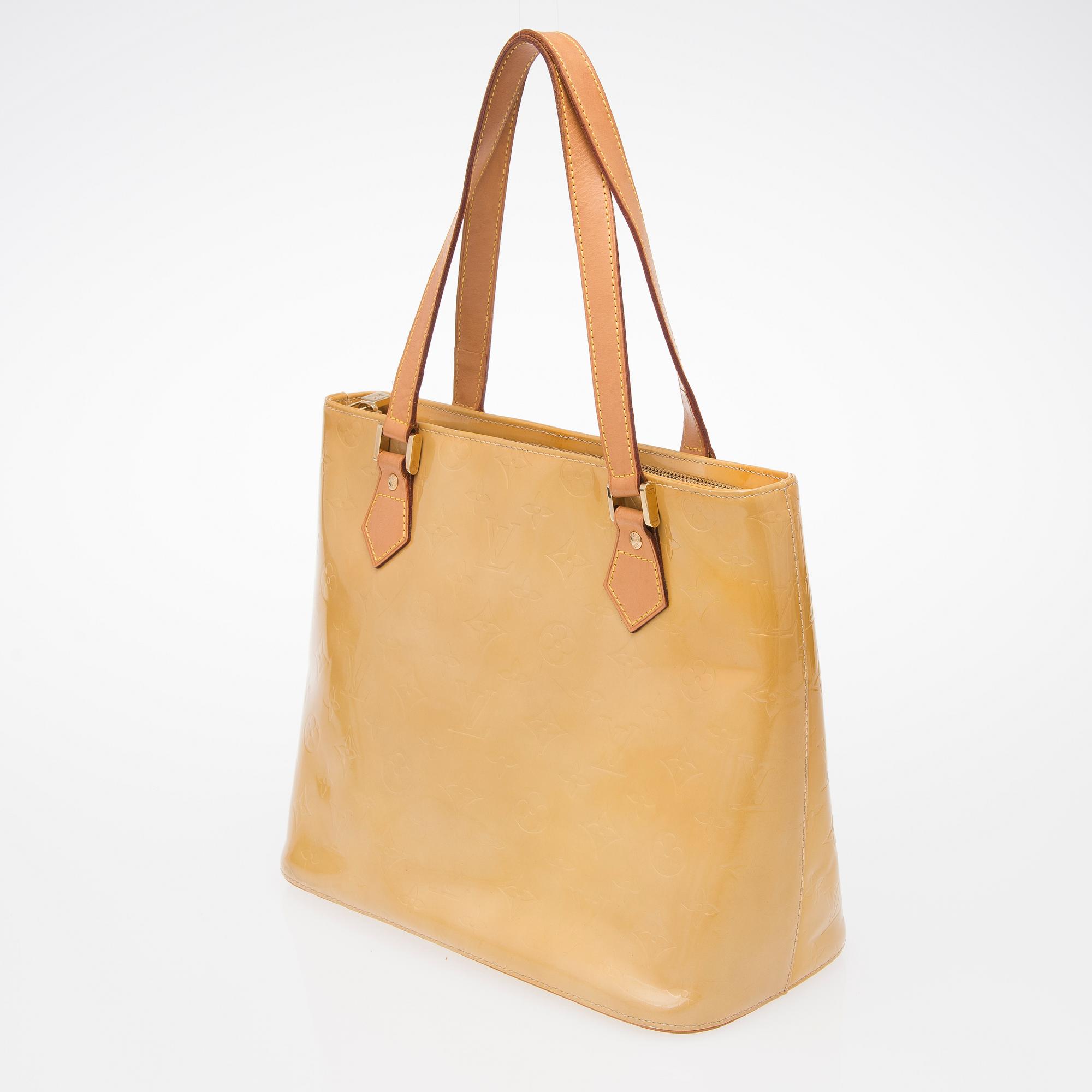 A Monogram Vernis Houston Bag.