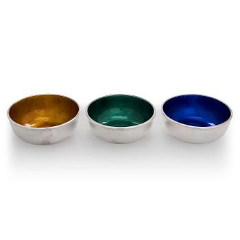 A set of three sterling silver and enamel bowls, maker's mark of A. Tillander, Turku 2005.