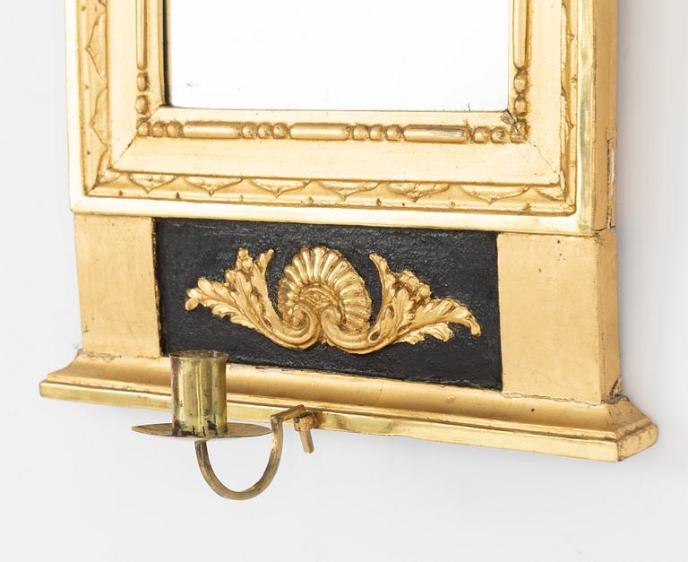 A mirror wall sconce, late Gustavian, early 19th Century.