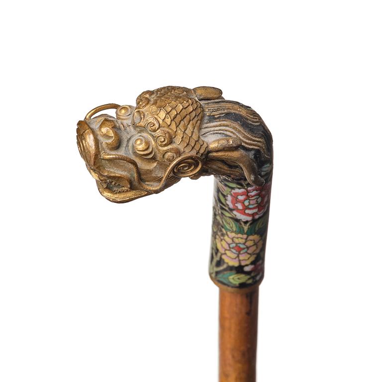 A Chinese bamboo walking cane with a cloisonné handle, late Qing dynasty/early 20th Century.