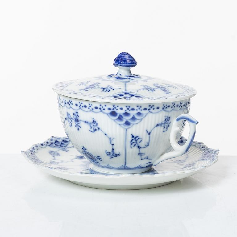 Royal Copenhagen, twelve consommé cups with saucers, 'Blue Fluted Half Lace', Denmark.