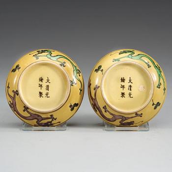 Two yellow ground dragon dishes, China, Republic 20th Century, with Guangxu six character mark.