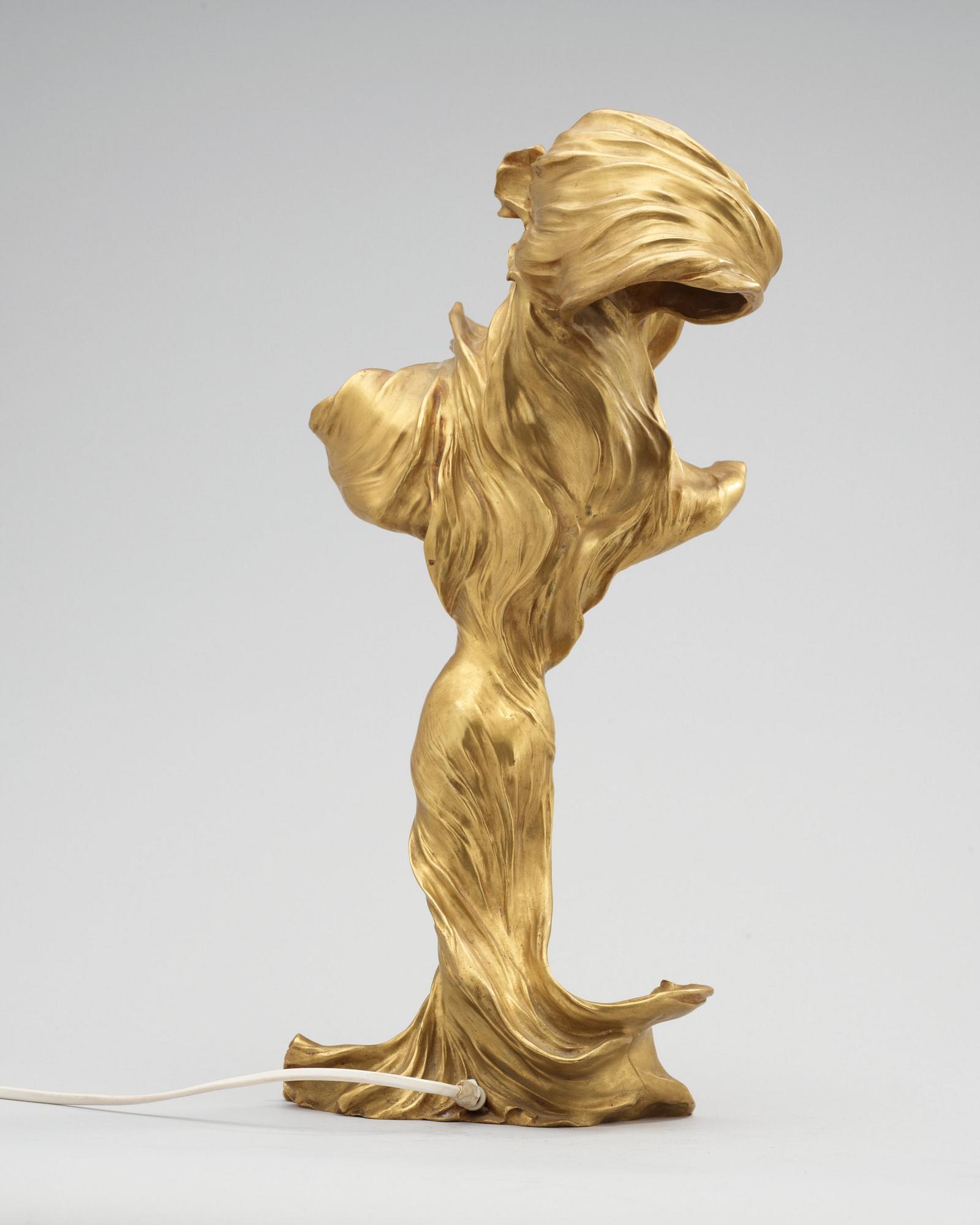 A Francois-Raoul Larche 'Loïe Fuller' Art Nouveau gilt-bronze figural table lamp, Siot-Decauville, Paris circa 1900.