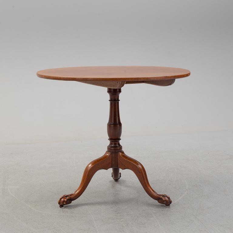 An 18th Century mahogany table.