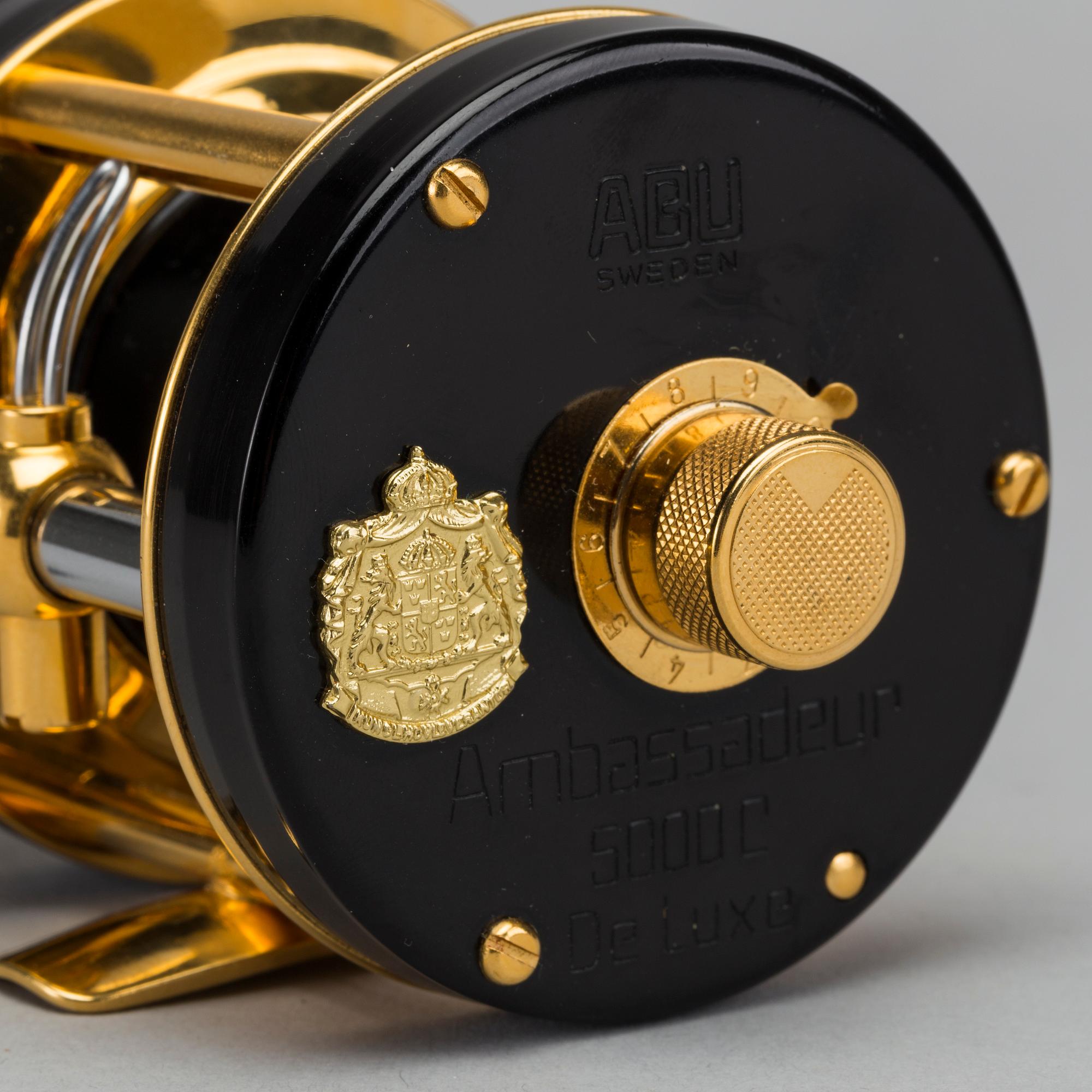 A guilded Ambassadeur 5000C De Luxe REEL BY ABU, SWEDEN. 1982