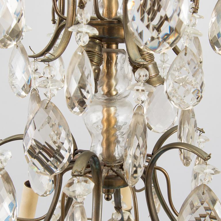 A rococo style chandelier, early 20th century.