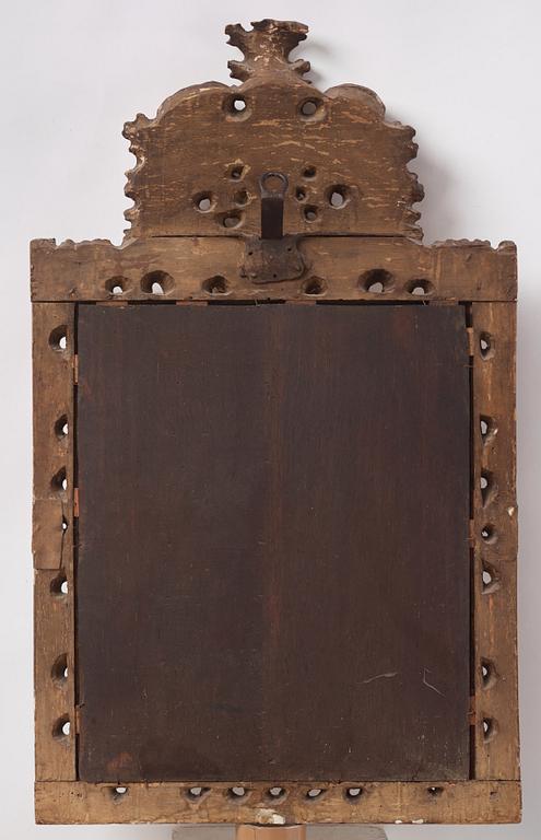 A baroque carved giltwood frame / mirror, circa 1700.