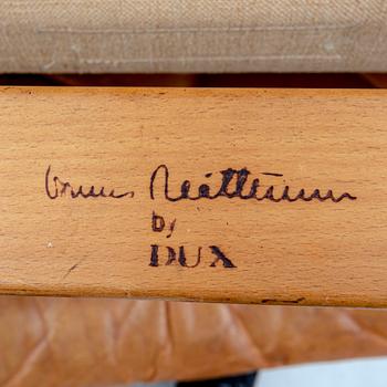 Bruno Mathsson, fåtölj och fotpall "Pernilla" för DUX senare delen av 1900-talet.