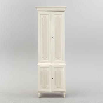 A contemporary Gustavian style cabinet.