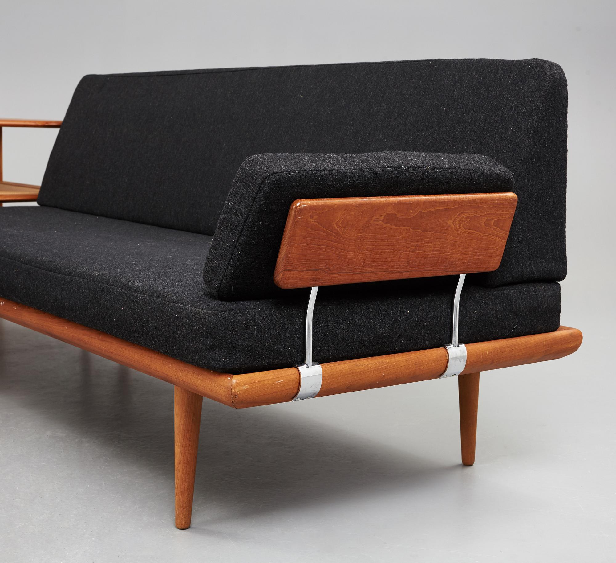 A set of two Danish 'Minerva' sofas with a table for France & Daverkosen.