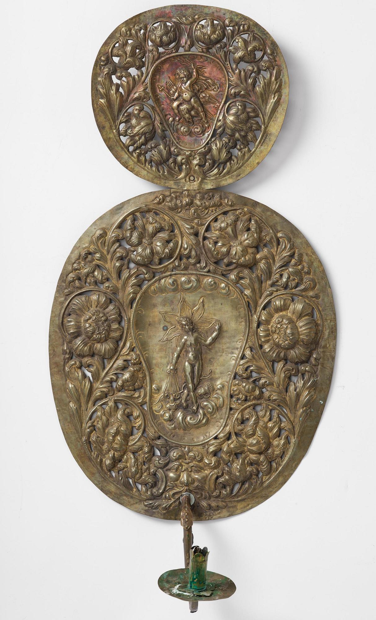 A set of four Swedish Baroque repoussé silvered brass reflector one-branch reflector plates, ca 1690-1700.
