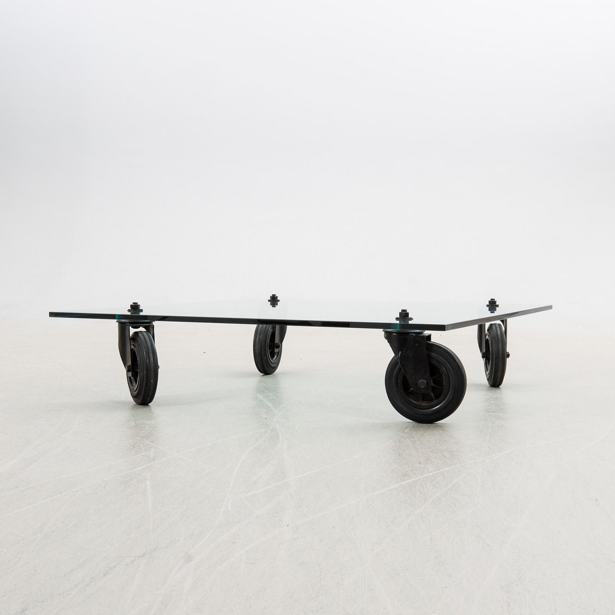 Gae Aulenti, coffee table, "Table with Wheels", Fontana Arte, Italy late 20th century/early 21st century.