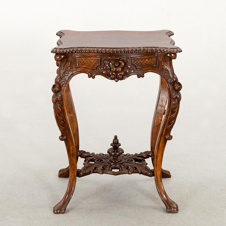 A NEO ROCOCO SMALL TABLE.
