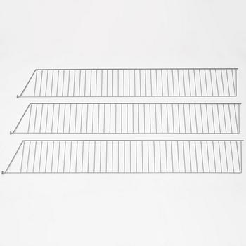 A 'String' shelving system by Nils Strinning, with three sides and 12 shelves.