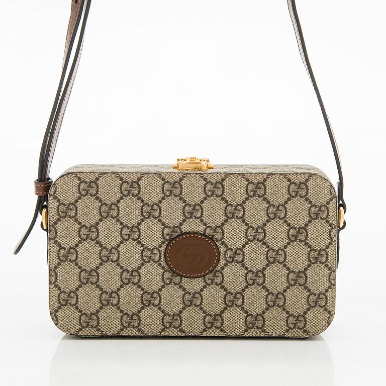 Gucci, "GG Supreme" laukku.