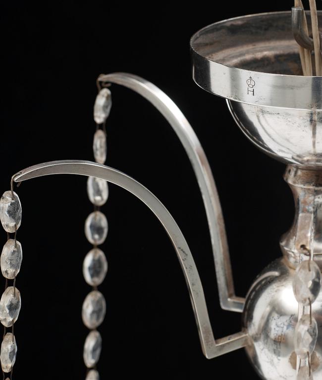 An Elis Bergh silver plated Swedish Grace chandelier, C.G. Hallberg, Stockholm.