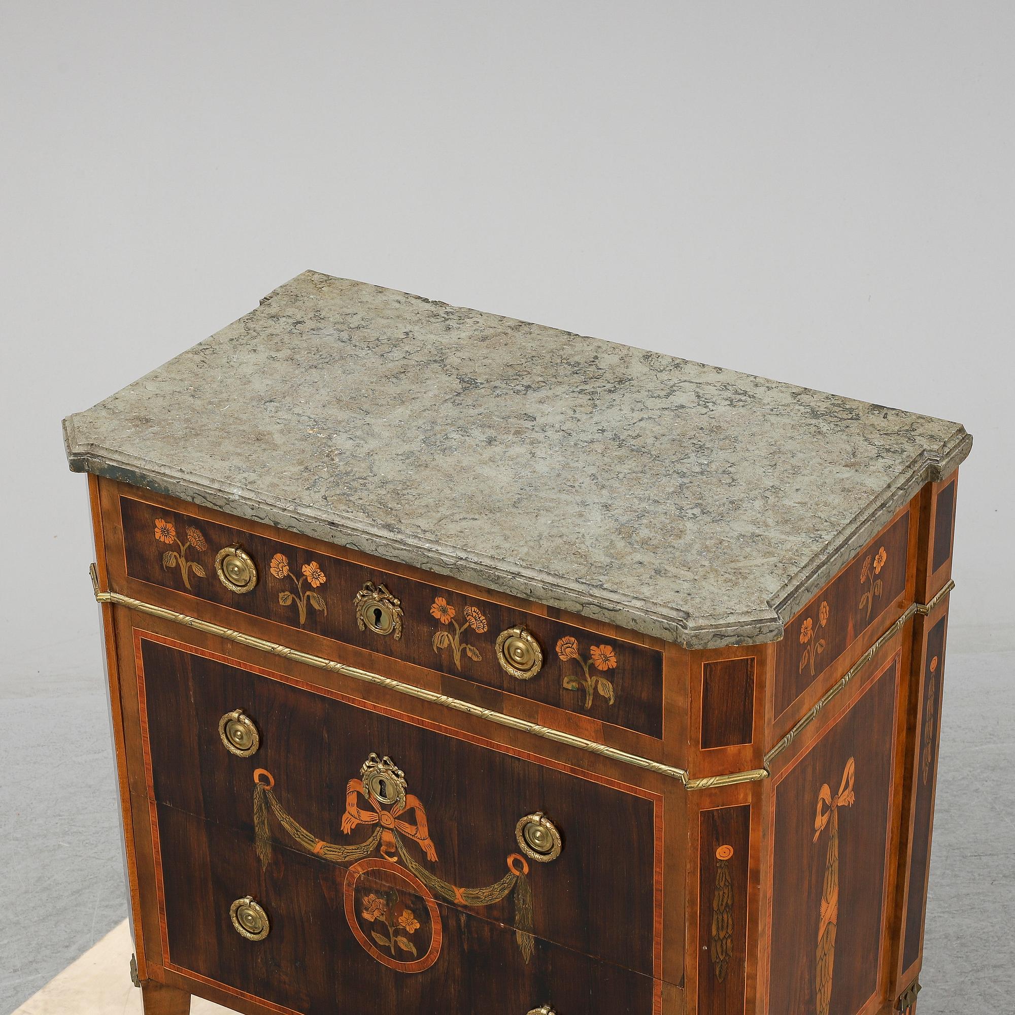 A commode in gustavian style 18 and 20 th century.