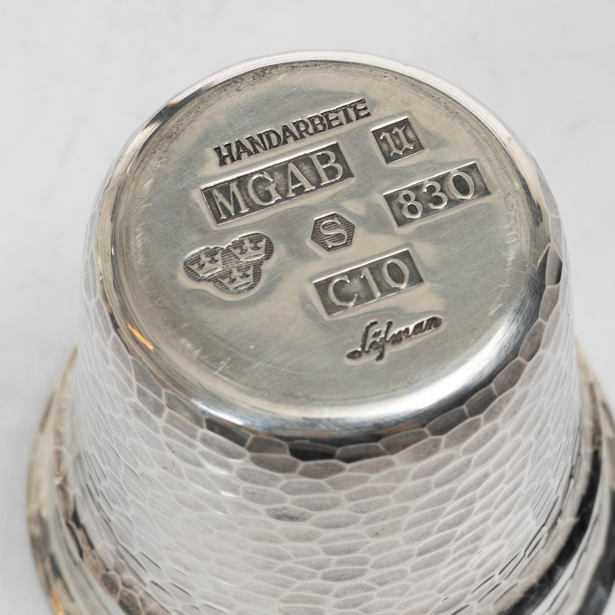 Eric Löfman, Fyra jaktbägare i silver samt läderfodral, MGAB, 1977.