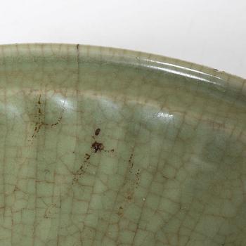 A large celadon glazed dish, Ming dynasty (1368-1644).