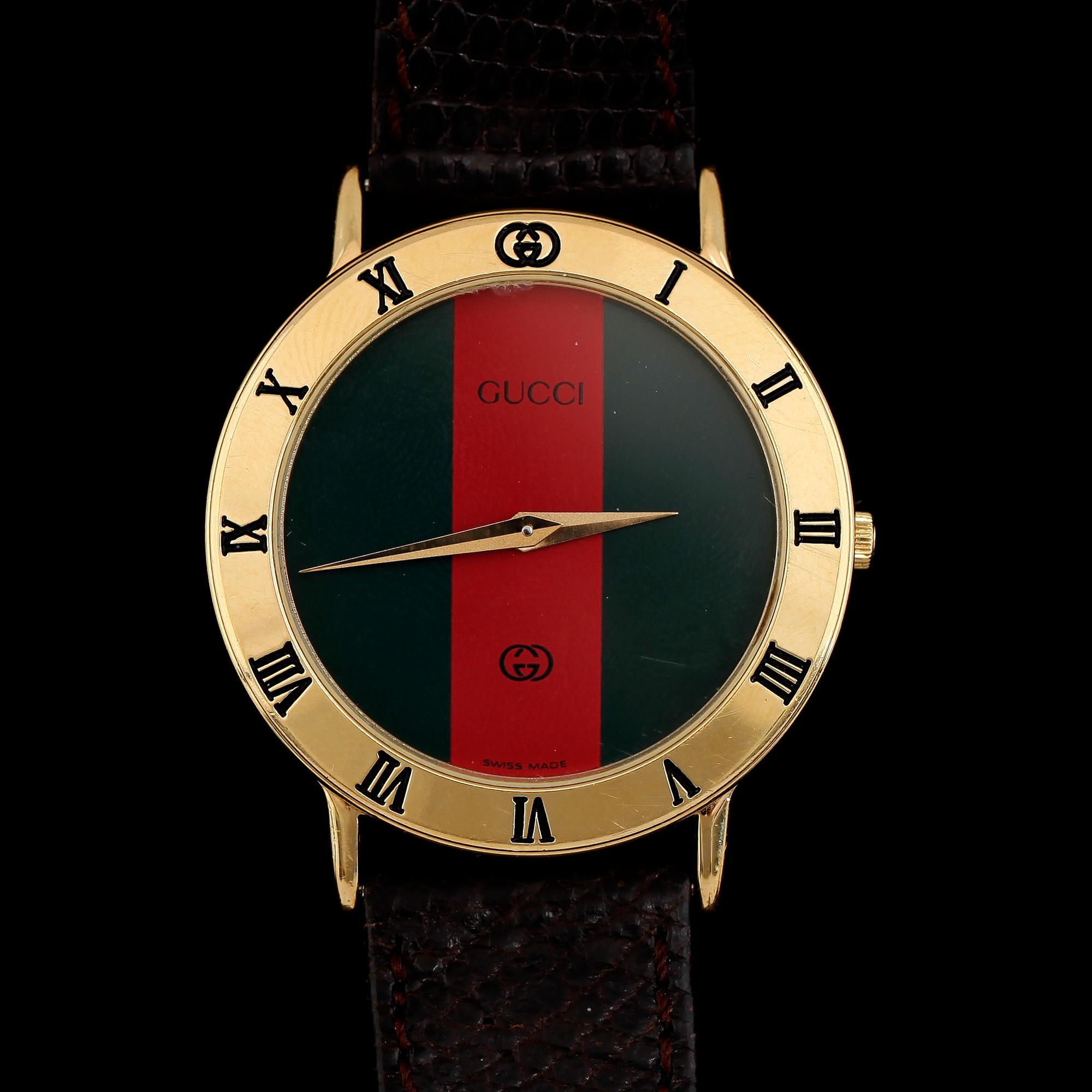 ARMBANDSUR, Gucci.