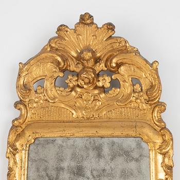 A Rococo mirror by Samuel Bomansson, Sweden, second half of the 18th century.