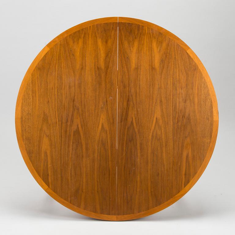 A 1960s teak and oak dining table.