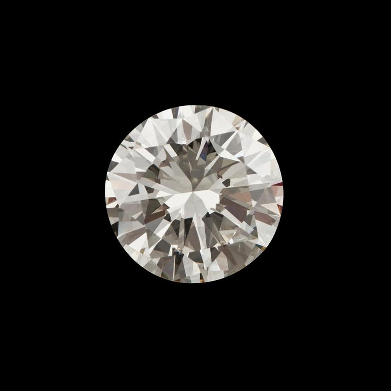 A loose 6.55 ct diamond. Light Yellow/VVS2-VS1.