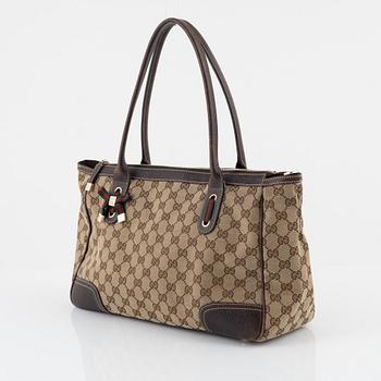 Gucci, a monogram canvas handbag.