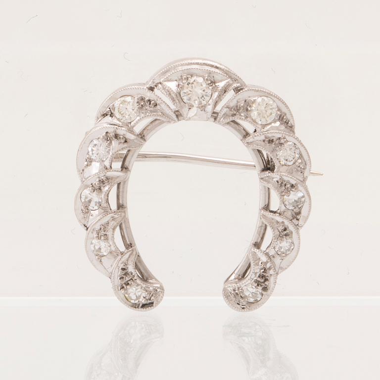 An 18K white gold brooch set with round single-cut and brilliant-cut diamonds, G. Dahlgren & Co Malmö 1950.